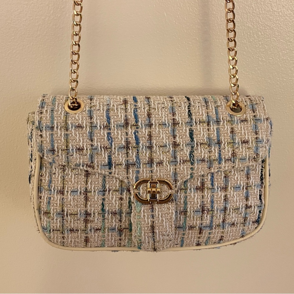 NEW cream, blue, and gold shoulder bag with cream and gold strap. Unused.